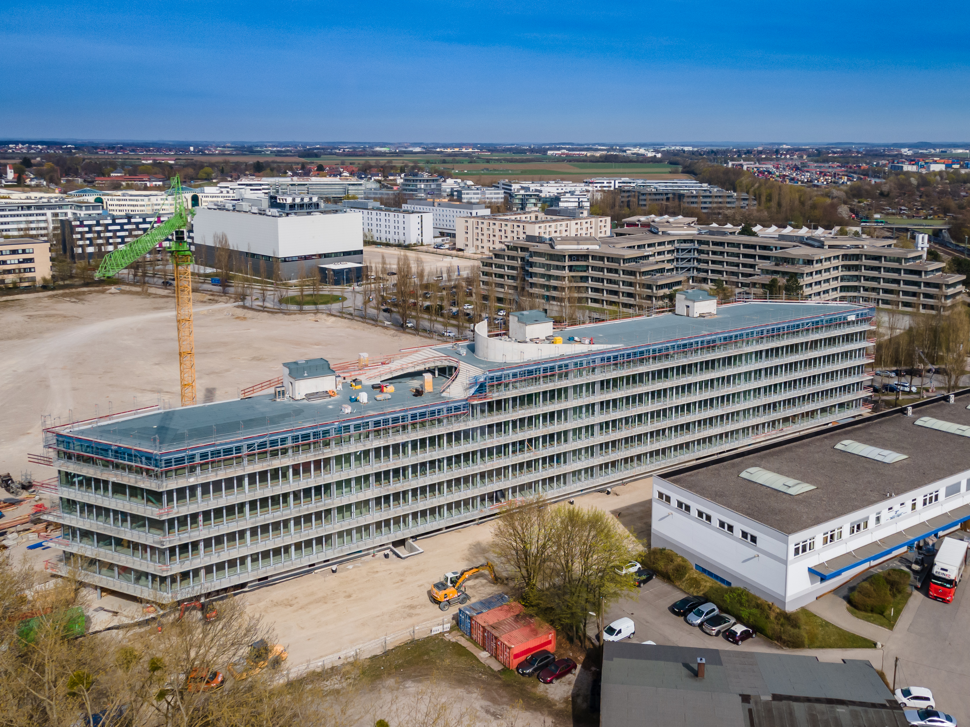 Hammerschmidt - Bürogebäude mit Dachterrasse und offenem Parkdeck - Magasépítés